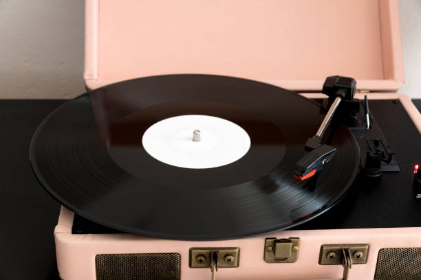 istock Vinyl played on the pink record player 653880702