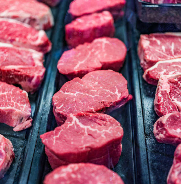 istock Cuts of tenderloin beef pieces on display in store 653880966