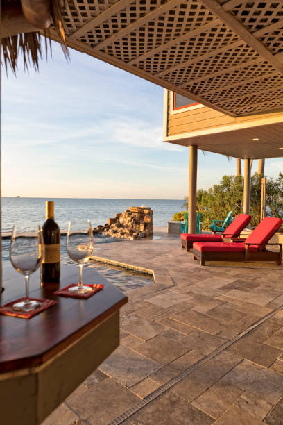 istock Beautiful Early Evening by the Swimming Pool in Tropical Setting 653890492