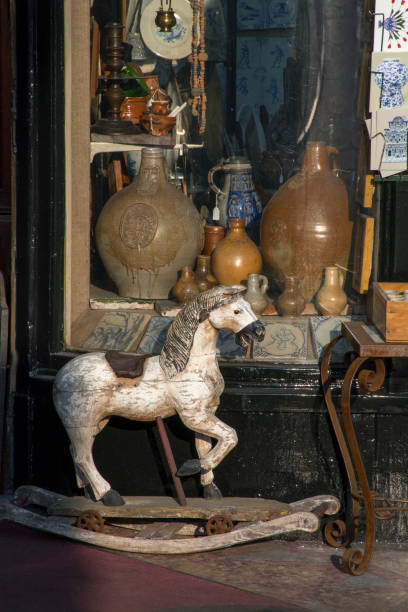 istock Very old white rocking horse 653891300