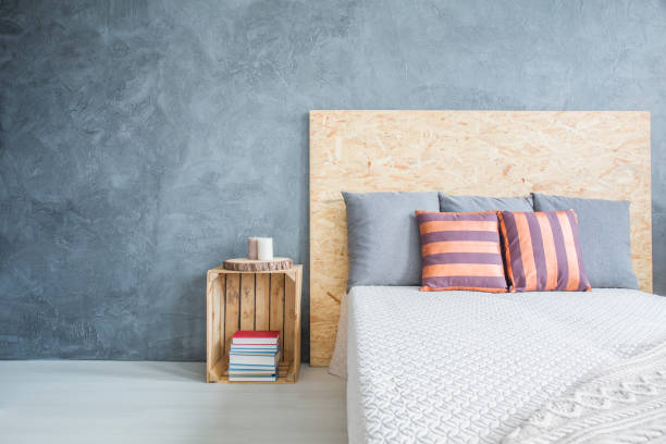 istock Bedroom with diy, wood bed 653892286
