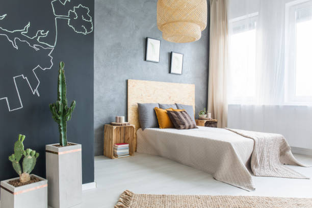 istock Trendy bedroom with double bed 653892306