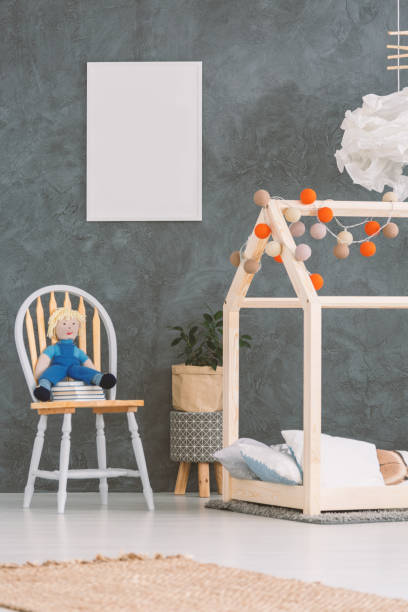 istock Baby room with house bed 653894486