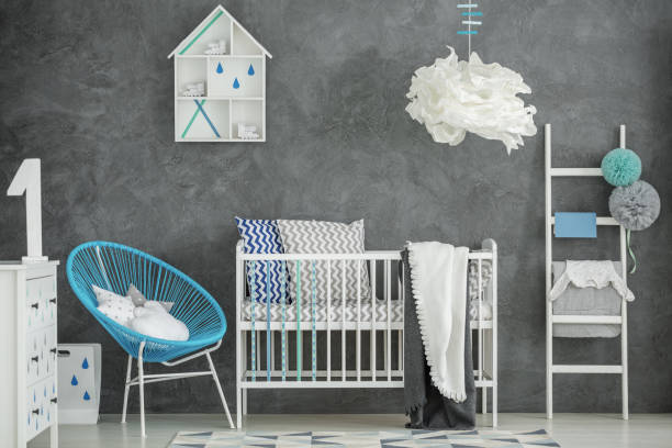 istock Baby bedroom with concrete wall 653894520