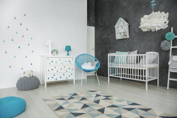 istock Bright baby bedroom with cot 653894534