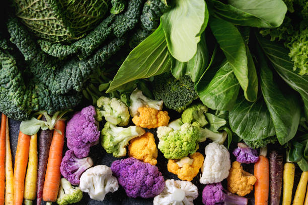 istock Green salads, cabbage, colorful veggies 653894820