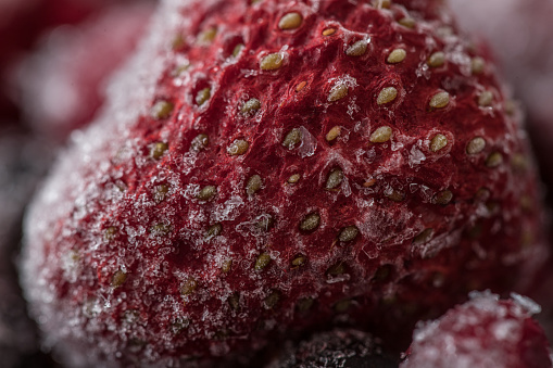 Close-up image of fresh strawberry isolated on white background
