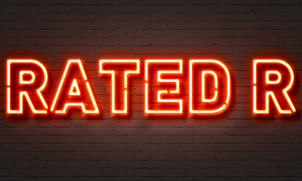 Rated R neon sign Rated R neon sign on brick wall background rated r stock illustrations
