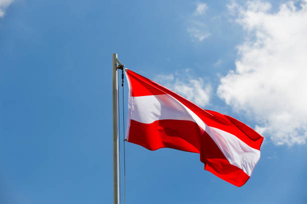 istock National flag of Austria on a flagpole 653900192