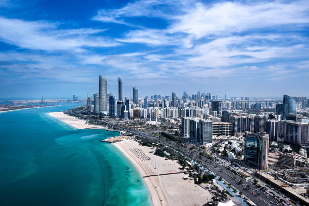 Abu Dhabi bay Aerial view of a bay in Abu Dhabi, UAE. Luxury hotel is also visible. corniche stock pictures, royalty-free photos & images