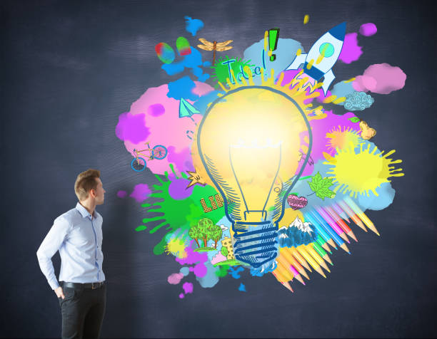 istock businessman and drawing success sketch 653903236
