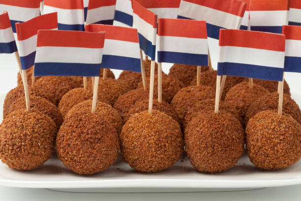 istock Dish with Dutch traditional snack croquettes with a Dutch flag 653906370