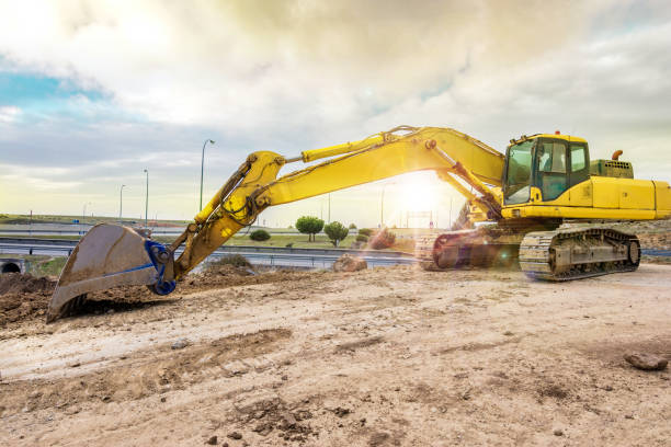 istock Outdoor mine with heavy machinery, earthmoving and rock excavators 653907082