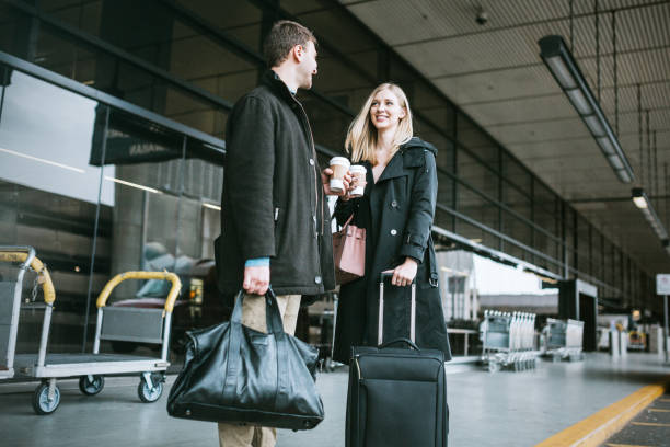 istock Couple Wait for Ride at Airport 653907206
