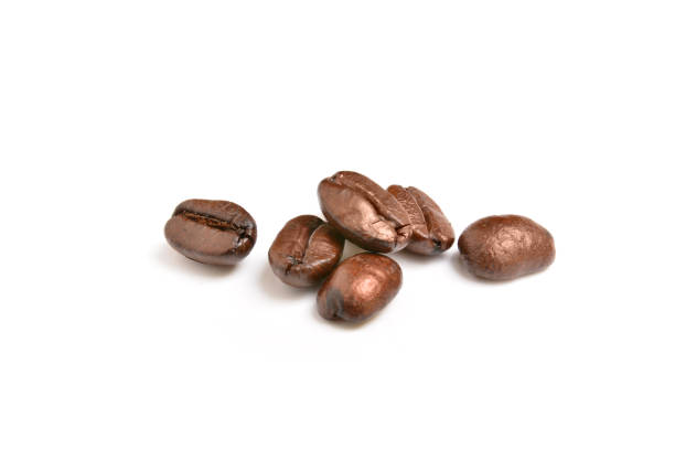 のコーヒー豆をロースト白背景  - coffee beans ストックフォトと画像