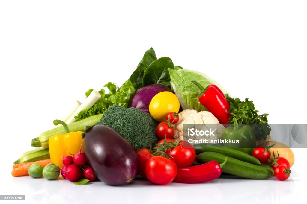 Stack of Fresh Vegetables Stack of fresh vegetables isolated on white background. Vegetable Stock Photo