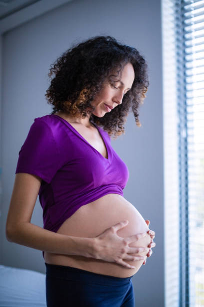 istock Pregnant woman standing in ward 653927450