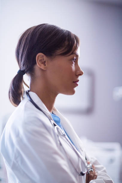 istock Thoughtful female doctor with stethoscope in ward 653927906