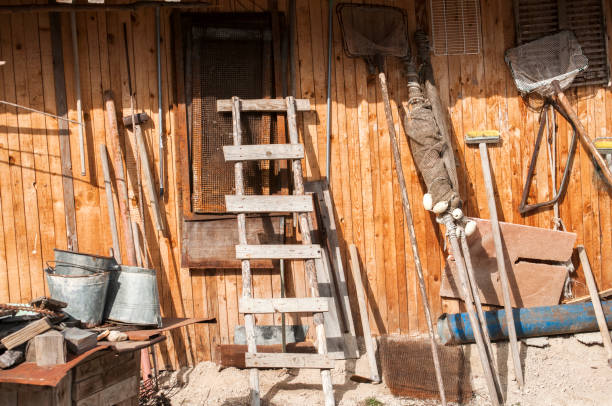 Wooden shed with tools and equipment at fish hatchery in mountain