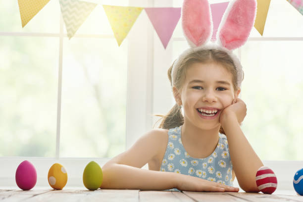 istock girl wearing bunny ears 653934052