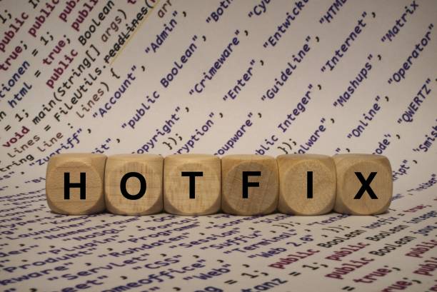 istock hotfix - cube with letters and words from the computer, software, internet categories, wooden cubes 653935980