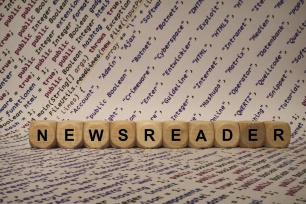 istock newsreader - cube with letters and words from the computer, software, internet categories, wooden cubes 653938966