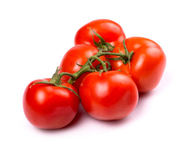 istock Red ripe tomatoes on a white background 653939038