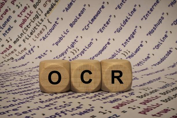 istock ocr - cube with letters and words from the computer, software, internet categories, wooden cubes 653939090