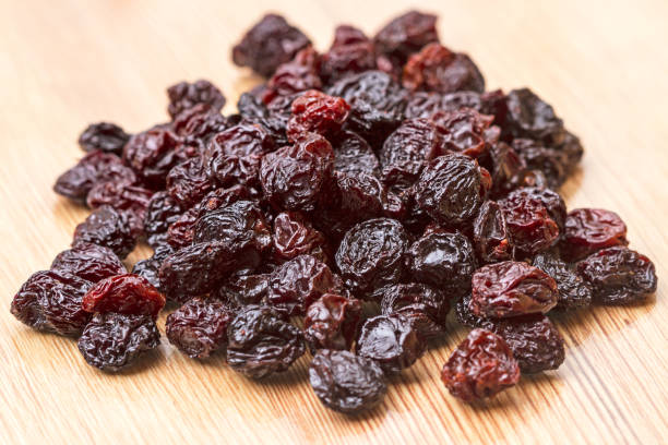 istock Bunch of raisins on a chalkboard 653939200