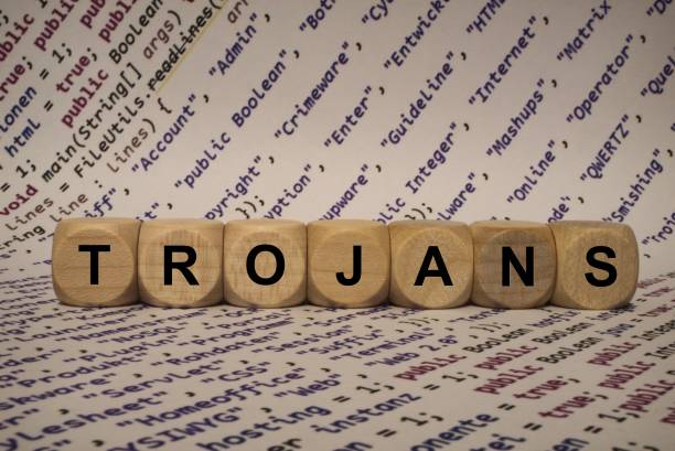 istock trojans - cube with letters and words from the computer, software, internet categories, wooden cubes 653943650