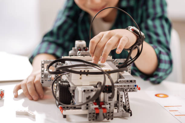 istock Gifted kid studying tech subject in the studio 653948750