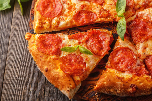 istock Pepperoni pizza with mozzarella cheese and tomato sauce 653951022