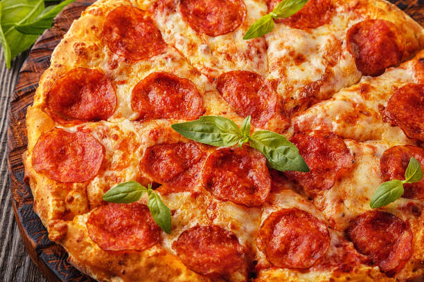 istock Pepperoni pizza with mozzarella cheese and tomato sauce 653951026