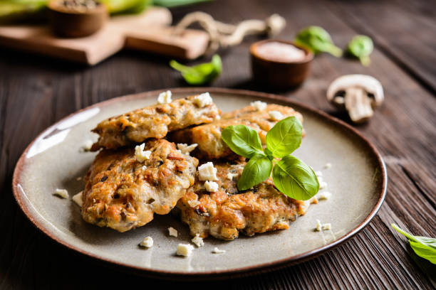 Vegetarian mushroom patties Vegetarian patties with mushrooms, Feta cheese and green onion goat cheese burger stock pictures, royalty-free photos & images