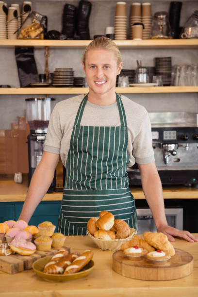 istock Portrait of waiter smiling 653959598
