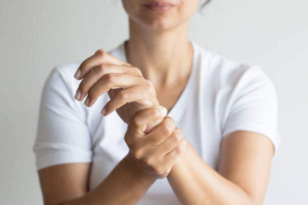 dolor de wirst - muñeca articulación fotografías e imágenes de stock