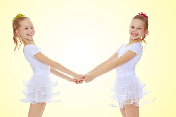 istock Cute girls holding hands 653962268