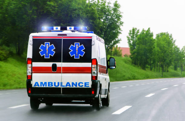 istock Ambulance van with flashing lights 653967220