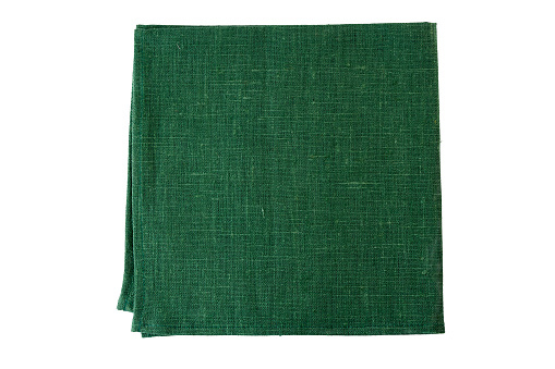 Green textile napkin isolated on white background