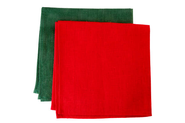 istock Two textile napkins, green and red, on white 653972664
