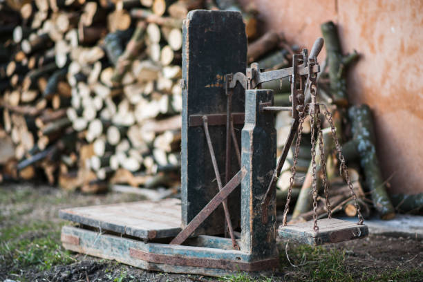 istock Ancient platform scales wood and iron weighing machine 653972686