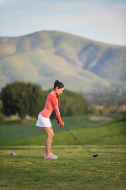 istock Young Hispanic Women Playing Golf 653975456
