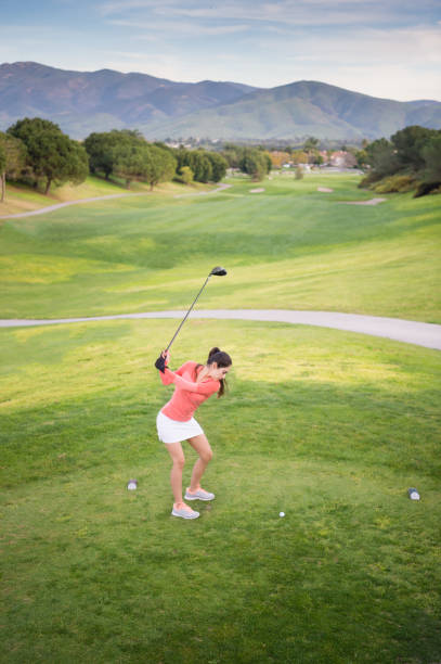 istock Young Hispanic Women Playing Golf 653975560