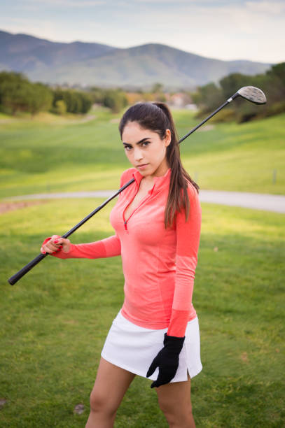 Young Hispanic Women Playing Golf