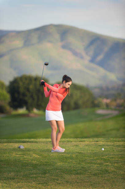 istock Young Hispanic Women Playing Golf 653975624