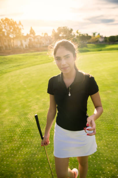 istock Young Hispanic Women Playing Golf 653975774