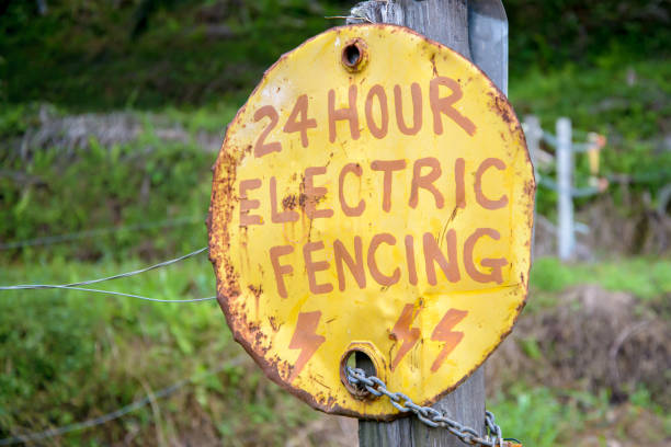 istock 24 hour rusty ecelctric fencing warning sign 653988438