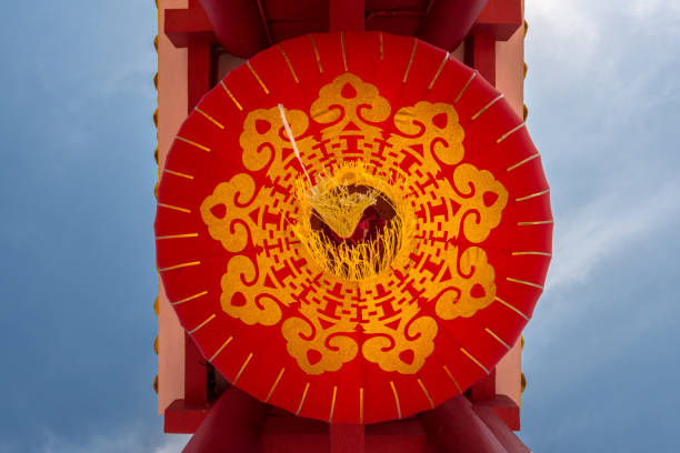istock Big red chinese lantern with shining golden decorative pattern 653990688