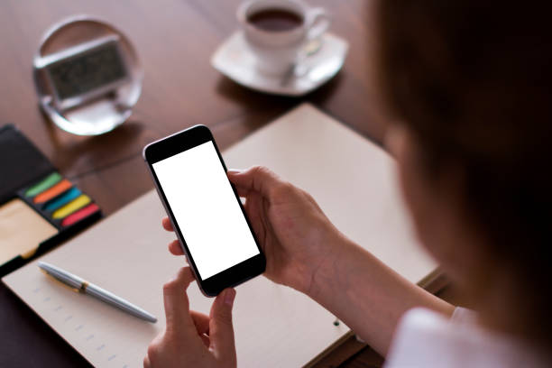 istock Businesswoman using smart phone 653991008