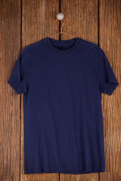 Navy blue t-shirt on hanger